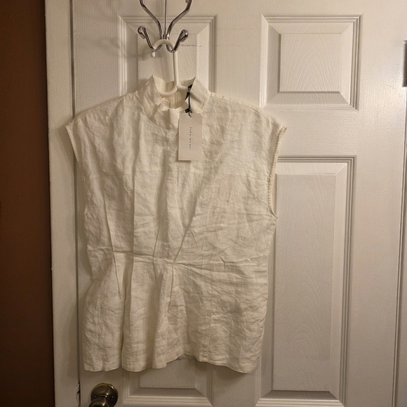 Elegant White Sleeveless Top - Picture 4 of 7